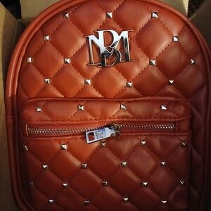 Red Quilted Badgely Mischka Backpack with Silver Accents